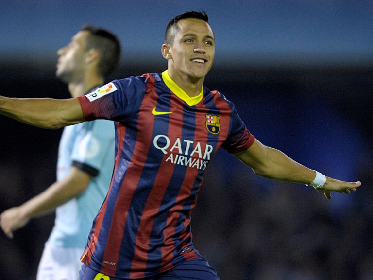 Alexis Sanchez enjoys Barcelona's victory.