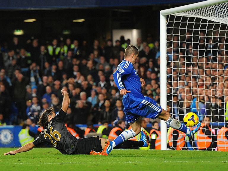 Fernando Torres scores Chelsea's winner against Manchester City.