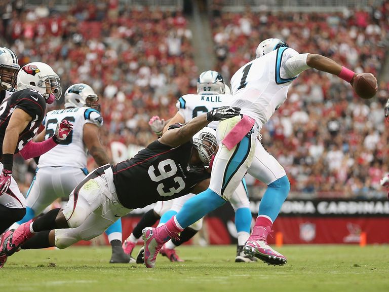 Cam Newton is sacked by Calais Campbell