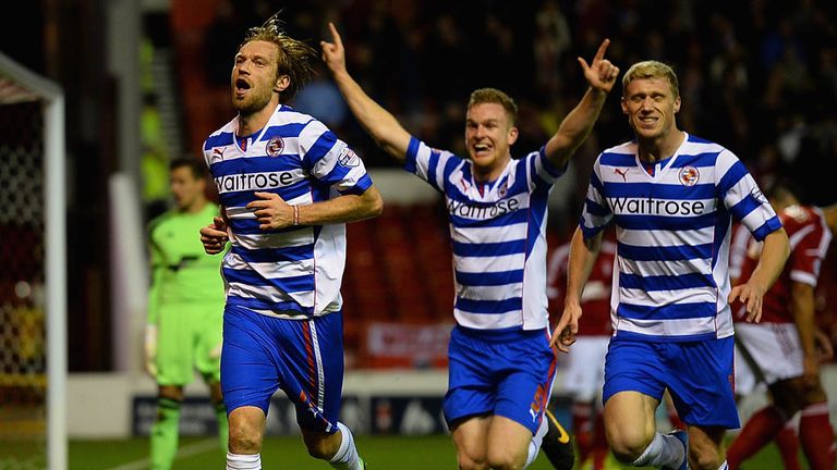Kaspars Gorkss: Celebrates Reading's second goal at the City Ground