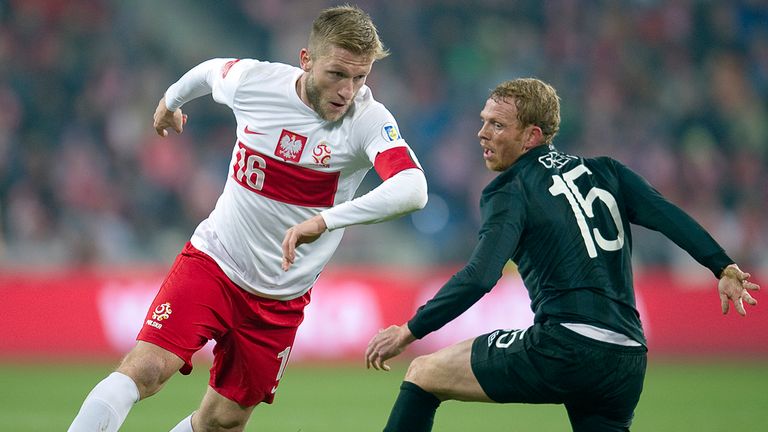 Jakub Blaszczykowski gets the better of Paul Green