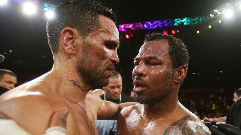 Anthony Mundine and Shane Mosley (r) embrace after the fight