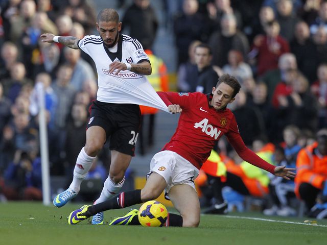 Dejagah tries to escape from Januzaj
