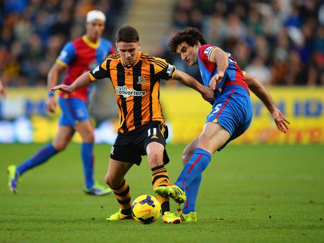 Robbie Brady tries to get past Mile Jedinak
