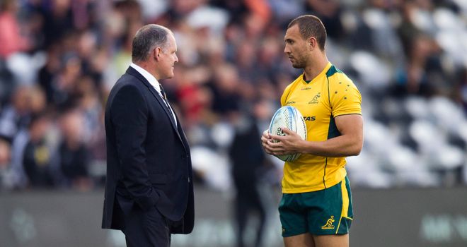 Ewen McKenzie (L): Australia coach hails his fly-half Quade Cooper (R)