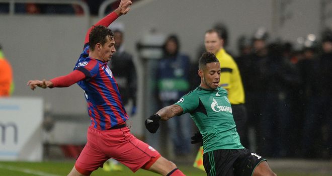 Alexandru Chipciu: Tries to tackle Dennis Aogo