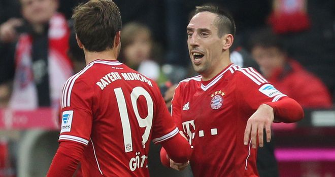 Bayern's Franck Ribery and Mario Gotze celebrate