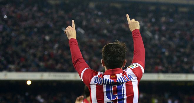 David Villa celebrates one of his two goals