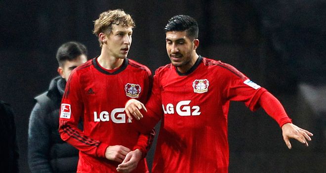 Stefan Kiessling (left) of Leverkusen celebrates with Emre Can