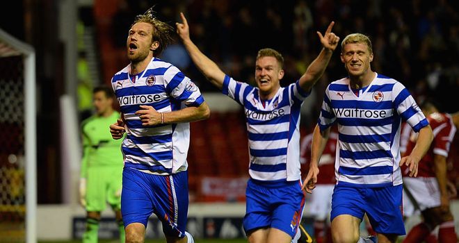 Kaspars Gorkss: Celebrates Reading's second goal at the City Ground
