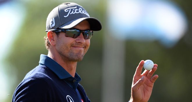 Adam Scott: Australian acknowledges the crowd during his second-round 66