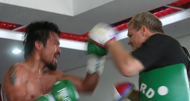 Manny Pacquiao trains with Freddie Roach