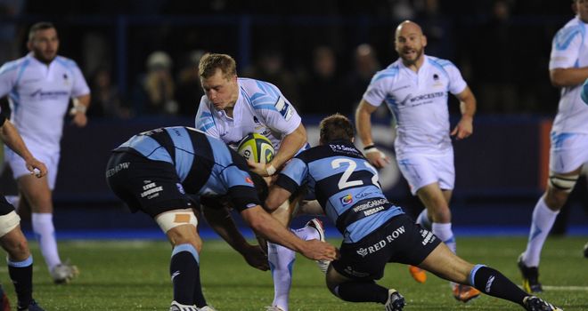 Worcester player Jake Abbott runs into the Blues defence