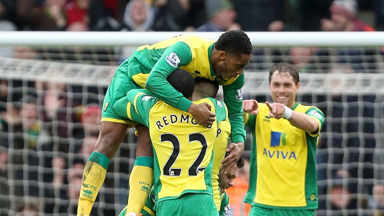 Gary Hooper: Buried beneath Norwich players celebrating his goal