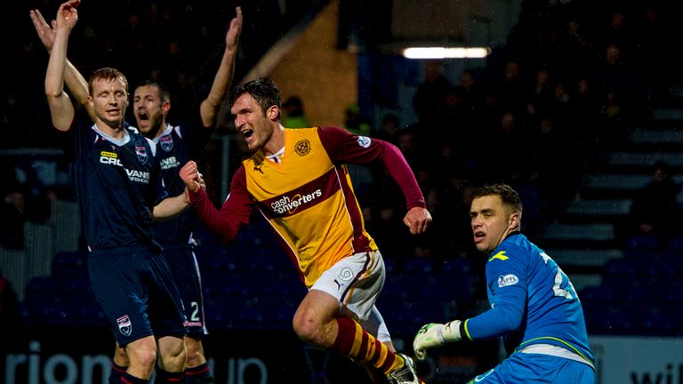 John Sutton celebrates opening the scoring in Dingwall