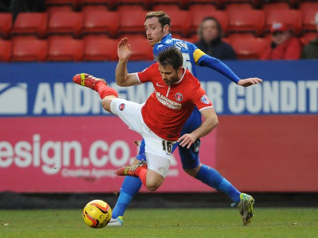 Charlton's Rhoys Wiggans is fouled by Richard Keogh