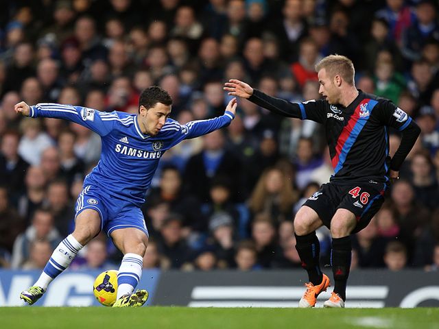 Eden Hazard is watched by Barry Bannan
