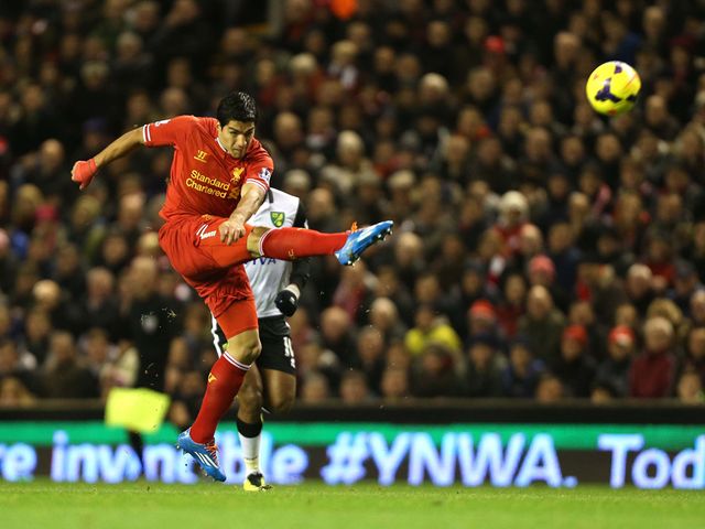 Luis Suarez scores his opening goal with this terrific strike