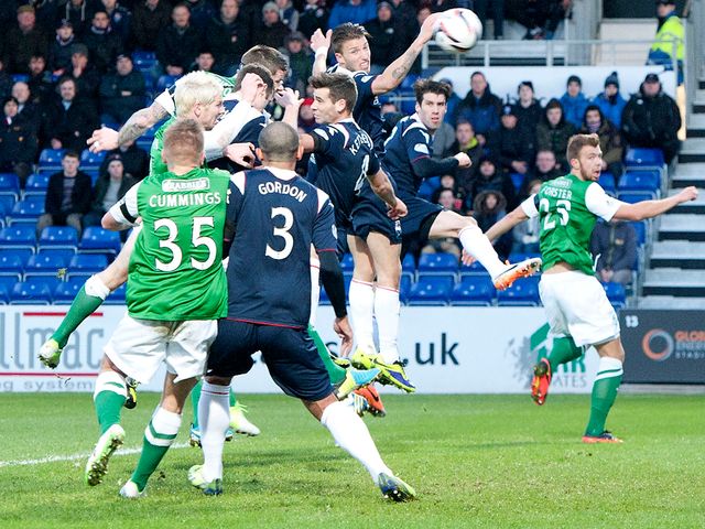 Michael Nelson heads Hibernian in front