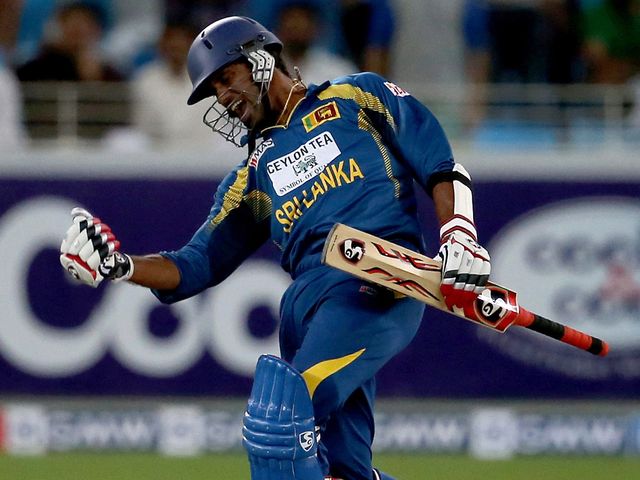 Sachithra Senanayake celebrates hitting the winning runs