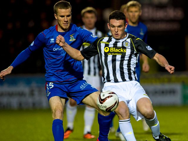 St Mirren's John McGinn shields the ball from Marley Watkins