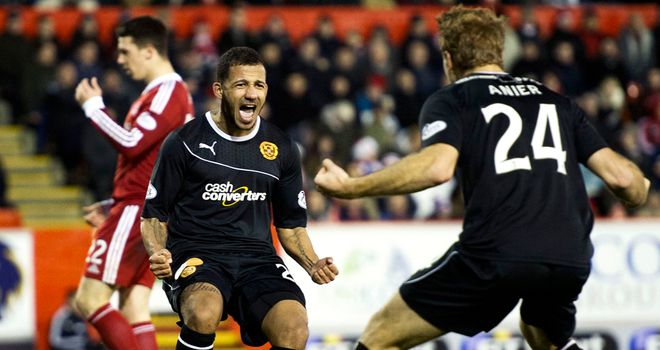 Lionel Ainsworth celebrates after scoring the goal which took Motherwell second in the table