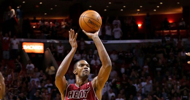 Chris Bosh scored a season-best 37 points as the Miami Heat edged the Portland Trail Blazers