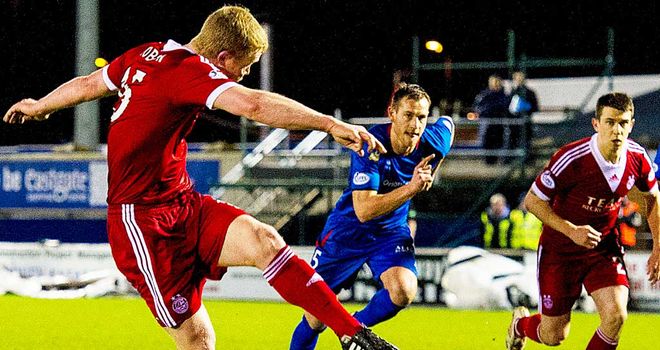 Barry Robson opens the scoring for Aberdeen against Inverness Caley