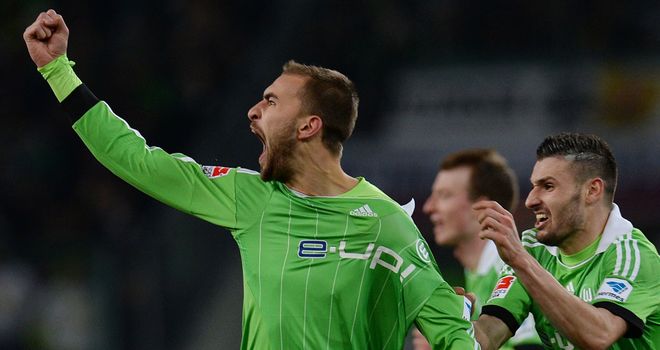 Bas Dost celebrates for Wolfsburg