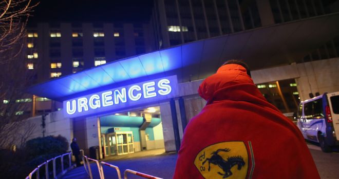 A Ferrari fan outside the medical centre in Grenoble where Schumacher is being treated