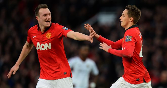 Phil Jones: Celebrates with goalscorer Adnan Januzaj