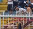 Vasco da Gama fans attack an Atletico Paranaense supporter
