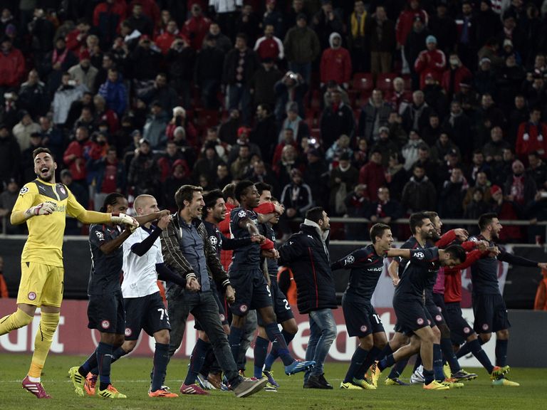 Olympiakos players celebrate