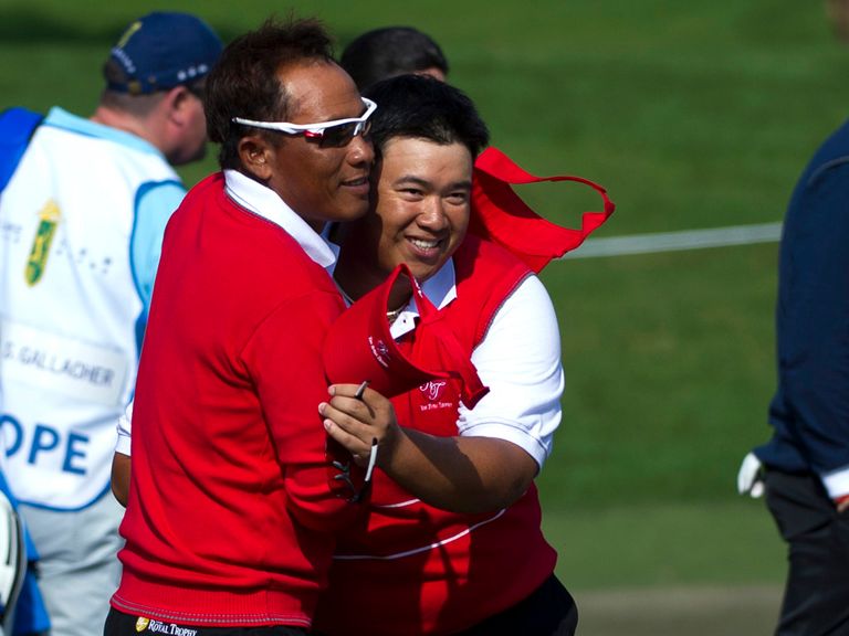 Thongchai Jaidee and Kiradech Aphibarnrat celebrate their win
