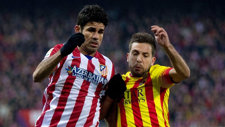 Diego Costa competes for the ball with Jordi Alba