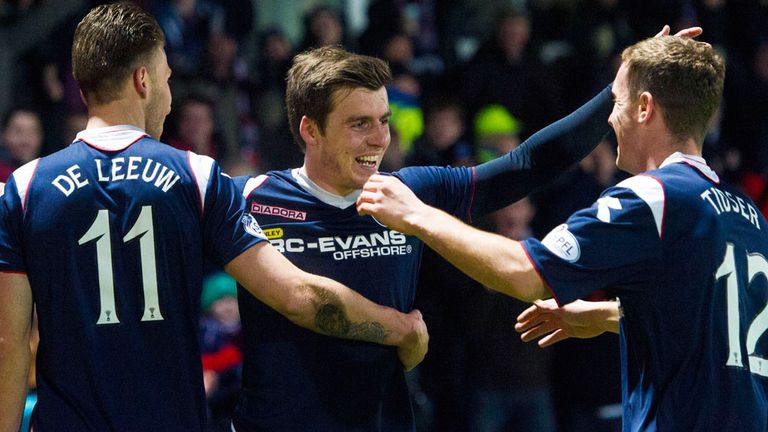 Graham Carey celebrates after bagging a late winner