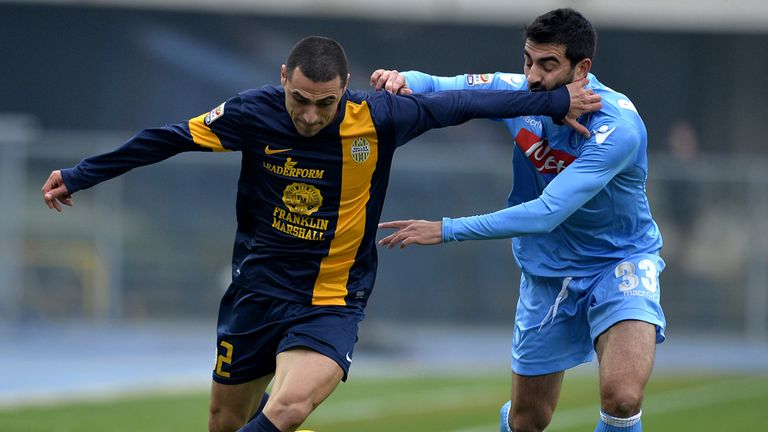 Verona's Romulo Souza Orestes vies with Napoli's Raul Albiol