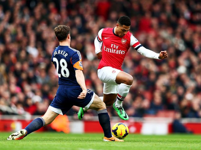 Serge Gnabry is tackled Scott Parker