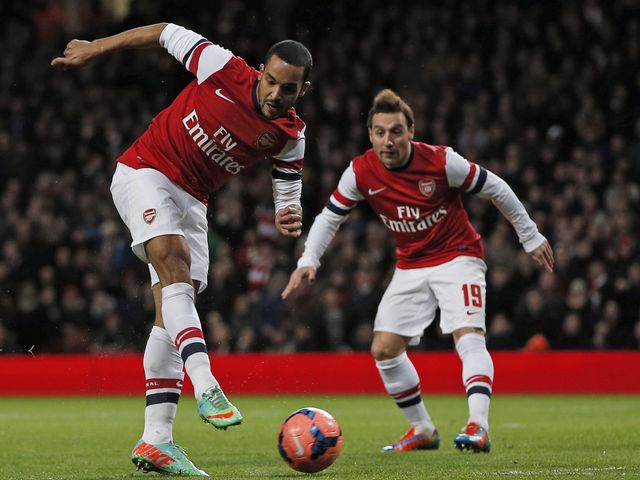 Theo Walcott shoots on goal