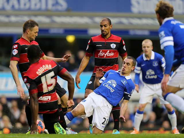 Leon Osman and Nedum Onuoha battle for the ball