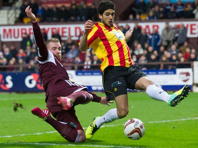 Gabriel Piccolo puts pressure on Hearts' Ryan Stevenson