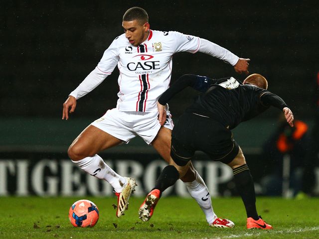 Ben Watson puts Daniel Powell under pressure