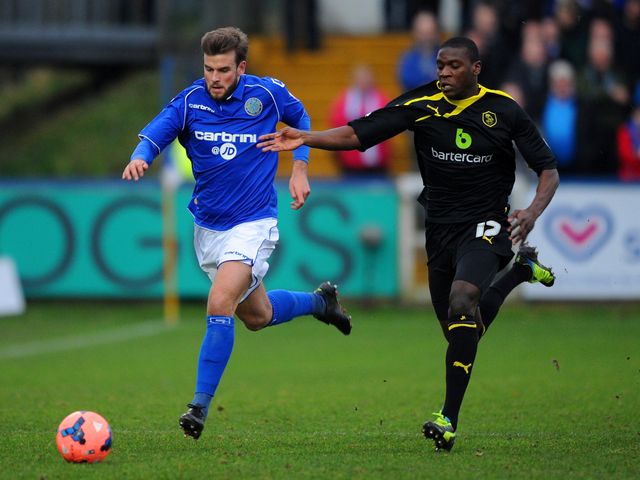 Andy Halls of Macclesfield Town and Jeremy Helan