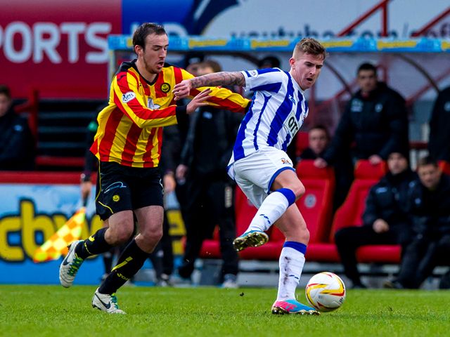 Stuart Bannigan chases down Craig Slater