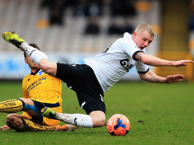 Andrea Orlandi knocks Jack Grimmer over