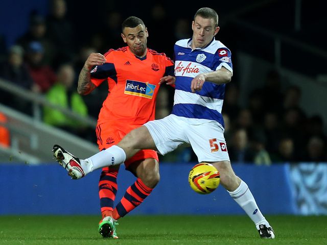 Craig Davies and Richard Dunne battle for the ball