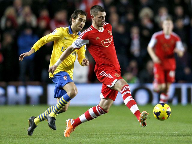 Mathieu Flamini challenges Morgan Schneiderlin