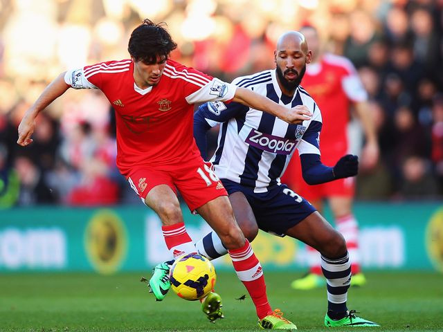 Jack Cork of Southampton holds off Nicolas Anelka