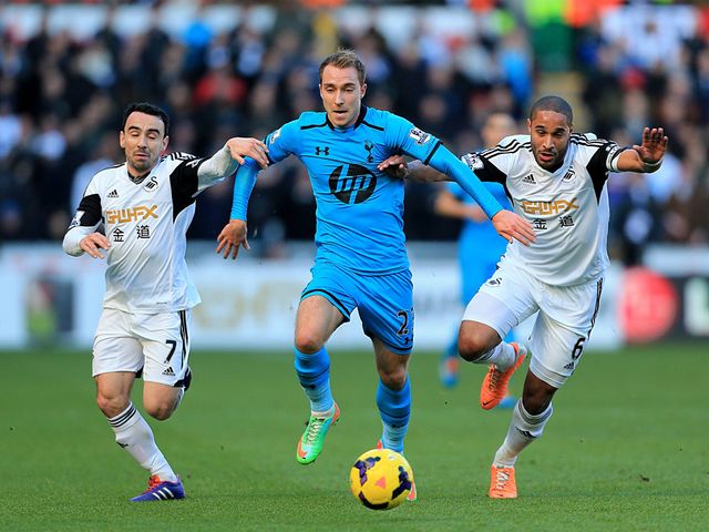 Christian Eriksen tries to make progress