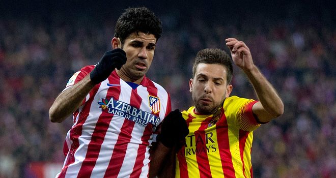 Diego Costa competes for the ball with Jordi Alba